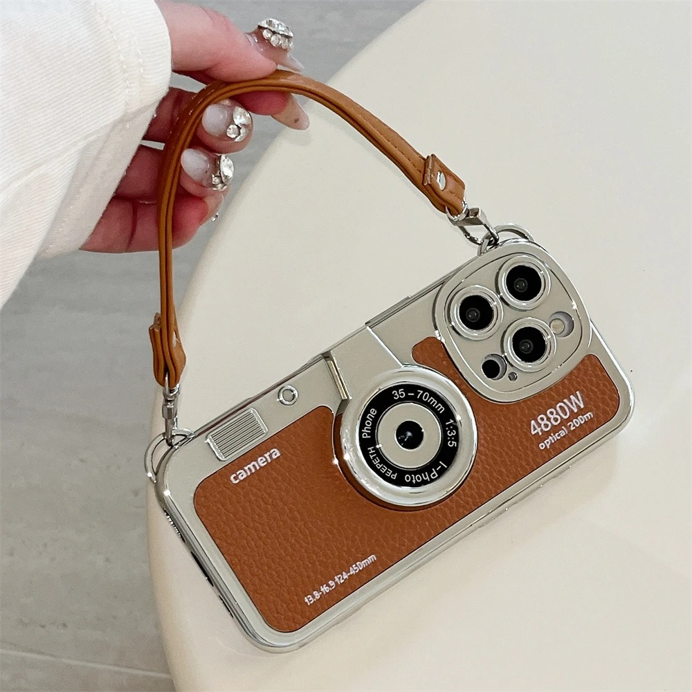 Luxury iPhone Retro Camera Case Emily in Paris Edition — PU Leather Sling Cover with Bracelet Strap, Stylish Pictorial Design, Shockproof Protective Finish
